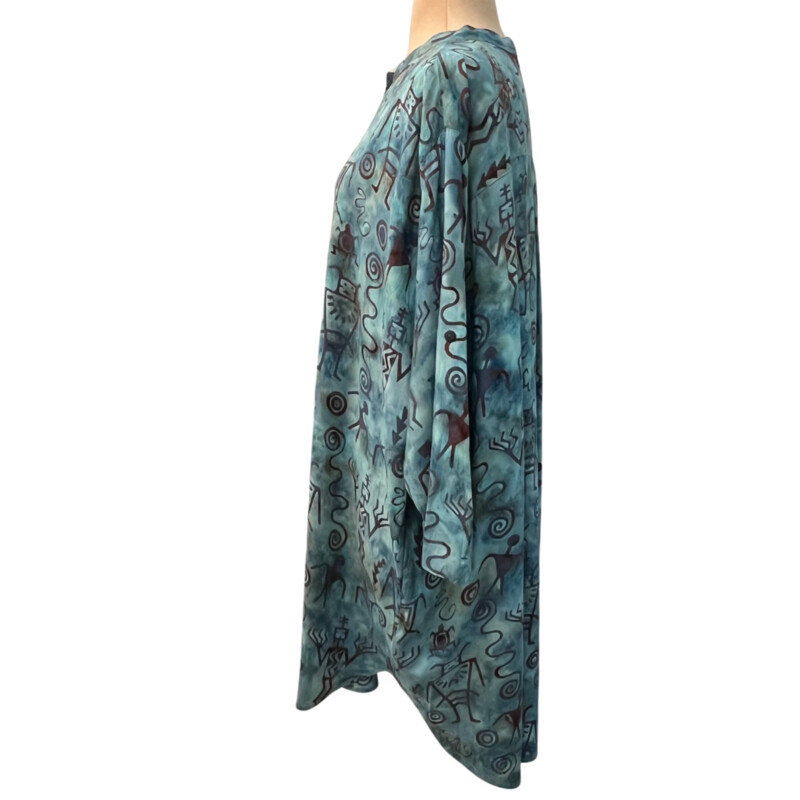 Betty Lous Tunic Top<br />
Batik Hieroglyph Print<br />
Roll-Tab Sleeve<br />
Hi-Lo<br />
Color: Blues, Teal, Aqua, Brown, and Ocean<br />
Size: L/XL<br />
100% Rayon