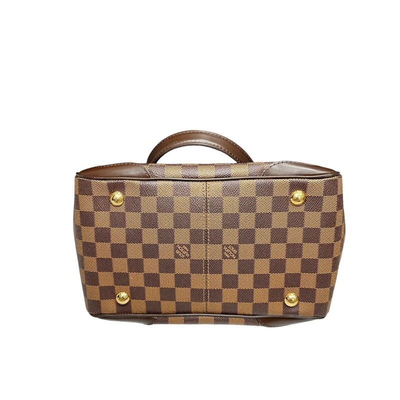 LOUIS VUITTON Damier Ebene Verona .<br />
<br />
Louis Vuitton's signature Damier check canvas in brown. This bag features dark chocolate brown leather top handles with matching trim and polished gold hardware. The top zipper opens to a scarlet red microfiber interior with patch pockets.<br />
<br />
Date Code: DU0150<br />
<br />
Dimensions:<br />
Base length: 10.75 in<br />
Height: 8.25 in<br />
Width: 6.00 in<br />
Drop: 6.75 in<br />
<br />
Comes With Key and Lock<br />
Condition: Great shape, Some corner love shown in photos.