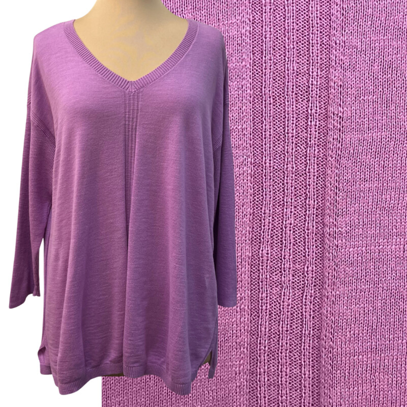 Talbots V-Neck Sweater
100% Cotton
Features a ribbed center stripe and side slits for a
flattering fit.
Color: Orchid
Size: Large