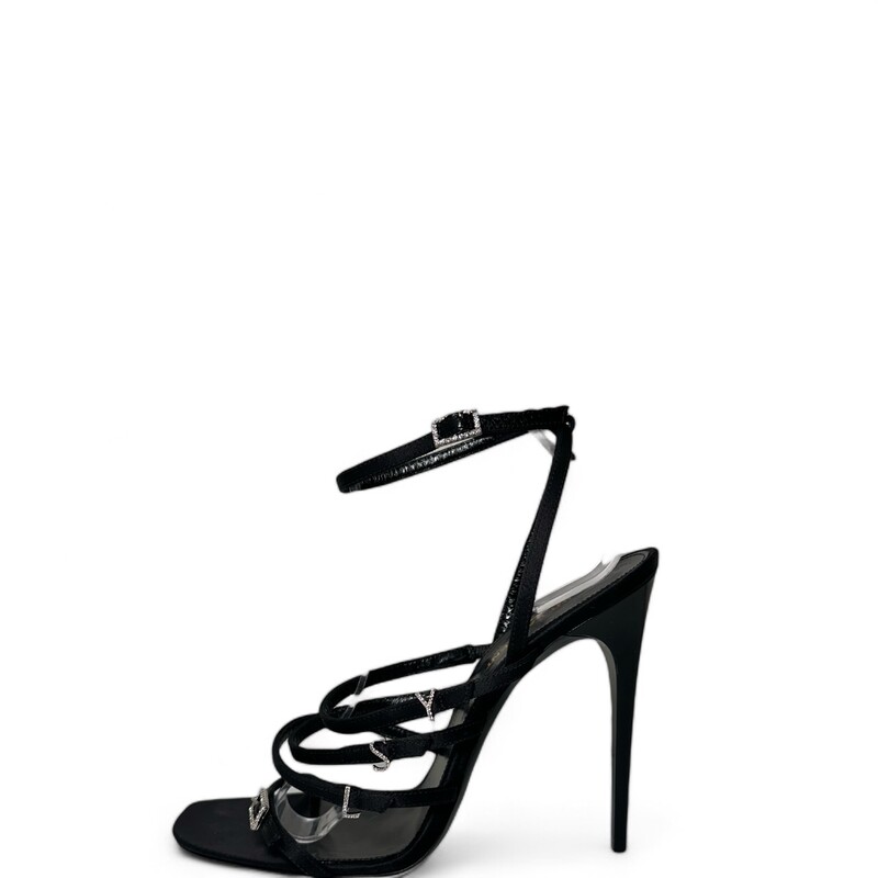 Saint Laurent Jerry silk mule sandals with crystal trim
3.75 in / 95 mm stiletto heel
Toe-loop strap
Three-band upper with crystal-embellished YSL charms
Slide style
Made in Italy
Some toe marks