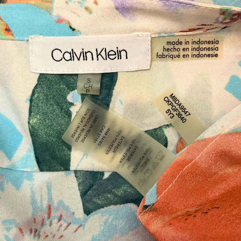 Calvin Klein Floral Blouse<br />
Roll-Tab Sleeves<br />
Color: Aqua, Lilac, Mint, Yellow, Green, Orange<br />
Size: Small