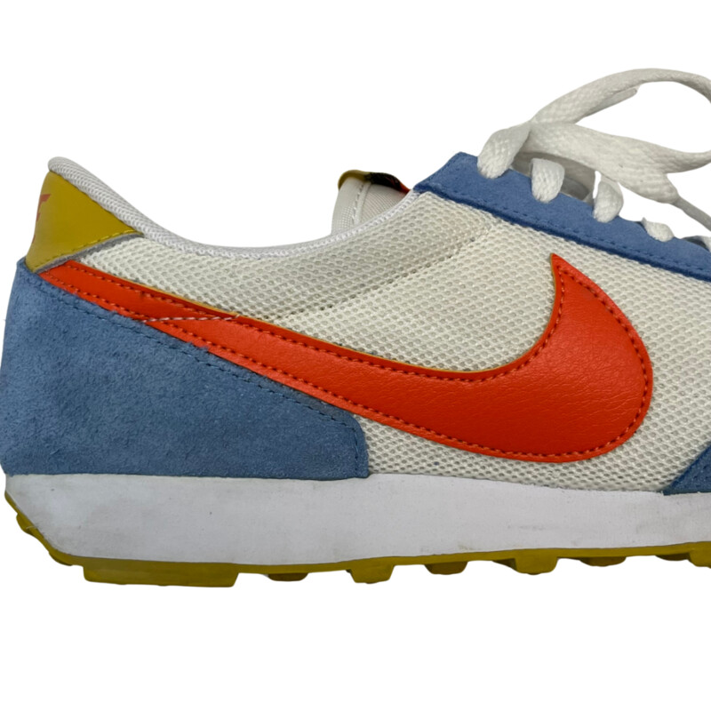 Nike Daybreak University Sneakers<br />
The sneaker makes use of a white mesh upper with powder blue suede overlays along the forefoot, heel and eyestay. A bright orange leather Swoosh cuts across the midfoot, while contrasting pops of yellow land on the leather heel tab and woven tongue tag. Underfoot, the matching yellow rubber outsole features Nike’s iconic waffle traction pattern for optimal grip.<br />
Color: Blue, Orange, Yellow, White<br />
Size: 8<br />
Insoles: SuperFeet