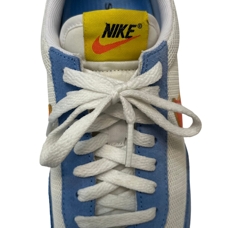 Nike Daybreak University Sneakers<br />
The sneaker makes use of a white mesh upper with powder blue suede overlays along the forefoot, heel and eyestay. A bright orange leather Swoosh cuts across the midfoot, while contrasting pops of yellow land on the leather heel tab and woven tongue tag. Underfoot, the matching yellow rubber outsole features Nike’s iconic waffle traction pattern for optimal grip.<br />
Color: Blue, Orange, Yellow, White<br />
Size: 8<br />
Insoles: SuperFeet