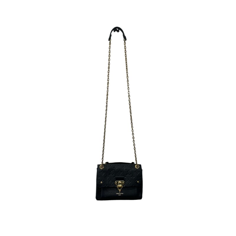 Louis Vuitton Vavin, Black, Size: BB
The new Vavin BB brings a contemporary twist to a classic bag. Its sophisticated mix of smooth and embossed Monogram Empreinte leather contrasts with the gold finish of the comfortable chain strap and the clasp modeled after Louis Vuitton’s historic trunk locks. Compact yet large enough to hold all the essentials, it makes a superb day-to-evening companion.
8.1 x 5.9 x 3.1 inches
(length x Height x Width)
Black
Embossed supple grained cowhide leather and supple grained cowhide leather
Supple grained cowhide leather trim
Microfiber lining
Gold-color hardware
Metal signature lock