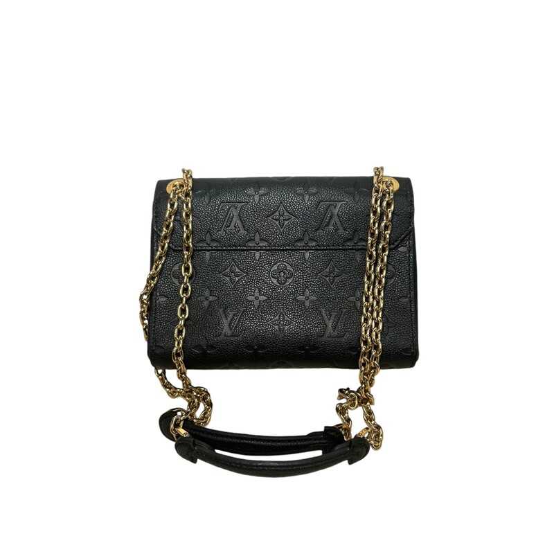 Louis Vuitton Vavin, Black, Size: BB
The new Vavin BB brings a contemporary twist to a classic bag. Its sophisticated mix of smooth and embossed Monogram Empreinte leather contrasts with the gold finish of the comfortable chain strap and the clasp modeled after Louis Vuitton’s historic trunk locks. Compact yet large enough to hold all the essentials, it makes a superb day-to-evening companion.
8.1 x 5.9 x 3.1 inches
(length x Height x Width)
Black
Embossed supple grained cowhide leather and supple grained cowhide leather
Supple grained cowhide leather trim
Microfiber lining
Gold-color hardware
Metal signature lock