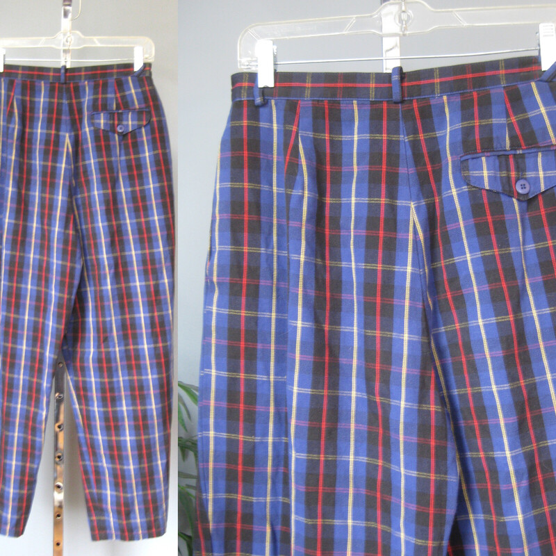 Vtg Cambridge Plaid, Blue, Size: 12<br />
1980s Preppy Plaid trousers in a red, navy, black and yellow by Cambridge Dry Goods.<br />
These are nice medium weight, very soft cotton unlined tapered pants.<br />
They have side pockets, belt loops.  One fake buttoned pocket in the front and one working buttoned pocket at the back.<br />
They're marked size 12, please use the measurments below though, they won't fit a modern size 12 probably<br />
Highwaisted , Tapered legs<br />
These are in great shape, no flaws, but they've been worn and washed a few times<br />
<br />
made in Taiwan<br />
Marked size 12, may fit smaller, please see measurements below:<br />
<br />
flat measurements:<br />
waist: 14.75<br />
hip: 25<br />
rise: 14.25<br />
inseam: 27.5<br />
Side seam: 41<br />
<br />
thanks for looking!<br />
#78027