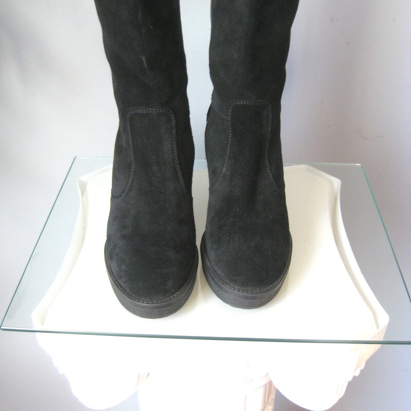 Italian Suede Wedge, Black, Size: 7<br />
New, only tried on inside<br />
Gorgeous pair of classic knee high boots in high quality black suede<br />
wedge heel made of a shock absorbing material will provide comfort and grip<br />
side zippers<br />
size 7 US / EUR 37<br />
Shaft from table top to top of boots: 17.5<br />
wedge heel 3.5<br />
shaft alone: 15<br />
<br />
thanks for looking!<br />
#72737