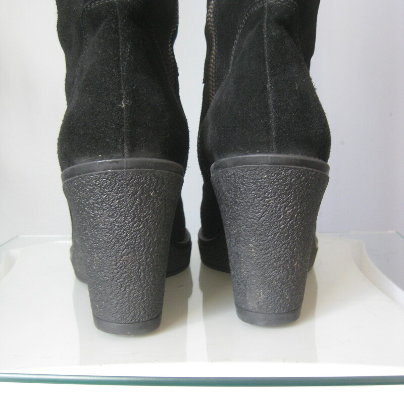 Italian Suede Wedge, Black, Size: 7<br />
New, only tried on inside<br />
Gorgeous pair of classic knee high boots in high quality black suede<br />
wedge heel made of a shock absorbing material will provide comfort and grip<br />
side zippers<br />
size 7 US / EUR 37<br />
Shaft from table top to top of boots: 17.5<br />
wedge heel 3.5<br />
shaft alone: 15<br />
<br />
thanks for looking!<br />
#72737