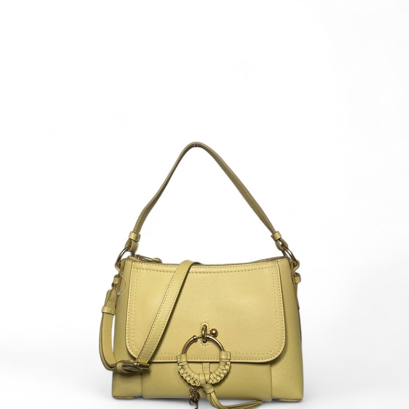 See by Chloé
Yellow Small Joan Crossbody Shoulder Bag
LWG-certified grained leather shoulder bag in yellow.

· Fixed carry handle
· Detachable and adjustable crossbody strap
· Spring ring with hardware and braided leather trim
· Concealed patch pocket at face
· Text embossed at face
· Zip closure
· Patch pocket at interior
· Cotton twill lining
· H8.25 x W11.5 x D5