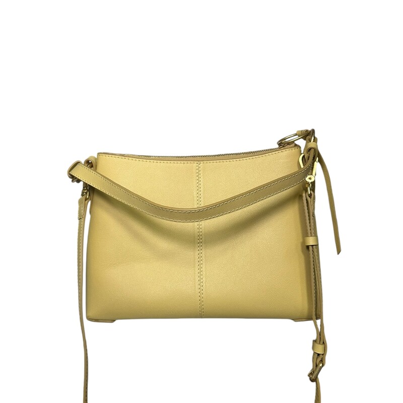 See by Chloé<br />
Yellow Small Joan Crossbody Shoulder Bag<br />
LWG-certified grained leather shoulder bag in yellow.<br />
<br />
· Fixed carry handle<br />
· Detachable and adjustable crossbody strap<br />
· Spring ring with hardware and braided leather trim<br />
· Concealed patch pocket at face<br />
· Text embossed at face<br />
· Zip closure<br />
· Patch pocket at interior<br />
· Cotton twill lining<br />
· H8.25 x W11.5 x D5