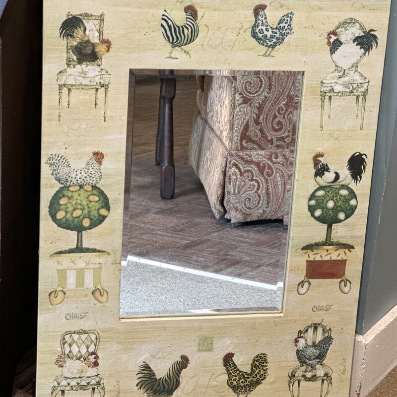 Rooster Framed Mirror,
Size: 23x32
A variety of colorful roosters decorate the edge of this nice beveled mirror.  Perfect condition.