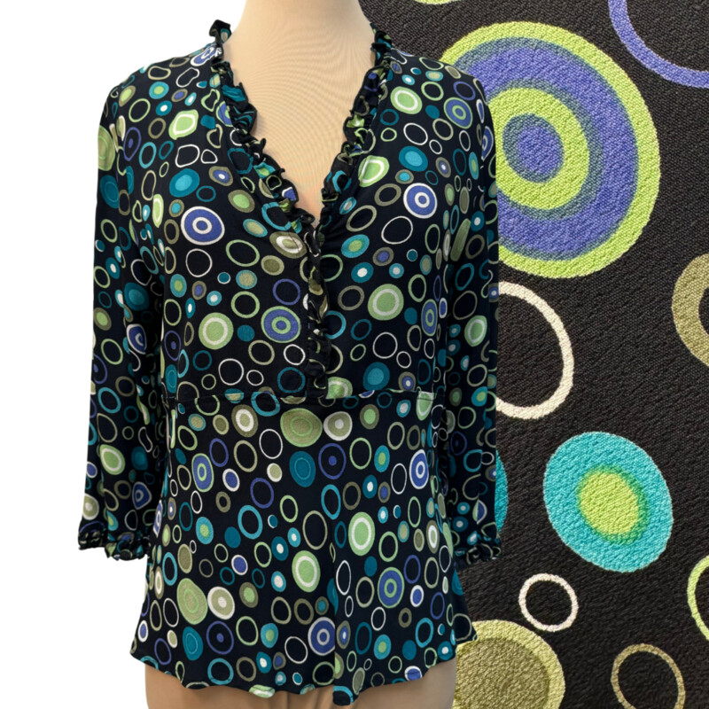 Loco Lindo Ruffled Blouse
100% Rayon
Ruffled neckline and sleeve hem
Colors:Black with Lots of Colorful Dots
Size: Medium