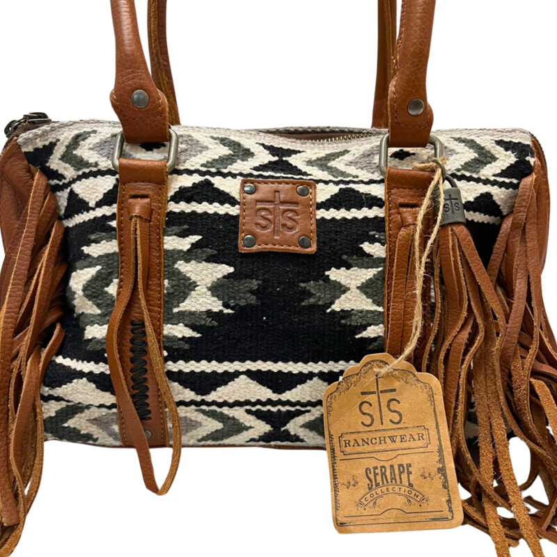 NEW Serape Choula Bag<br />
Genuine leather peiced woven serape purse<br />
The greater the storm, the brighter your rainbow. interior graphic<br />
Zipper closure<br />
Fringe trim and tassle details<br />
Compact/sub-compact interior carry holster<br />
Colors: Black, White, brown<br />
Dimension: 12 1/2 (L) x 5 (W) x 8 1/2 (H)