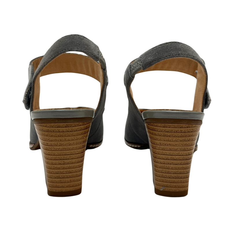 Sundance Eden Path Pumps<br />
Woven details across adjustable strap<br />
Almond toe<br />
Stacked block heel<br />
Approx 2in heel<br />
Suede leather upper<br />
Color: Blueish gray color with light gray accent<br />
Size: 8.5