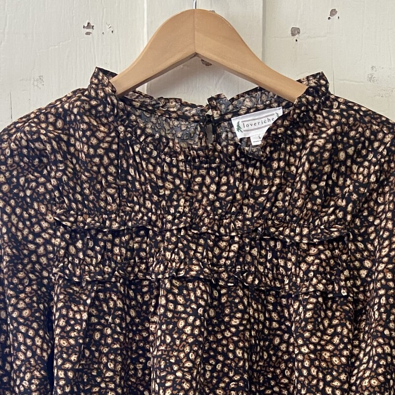 Brw/tn/blk Ruffle Blouse<br />
Brw/t/bk<br />
Size: Large