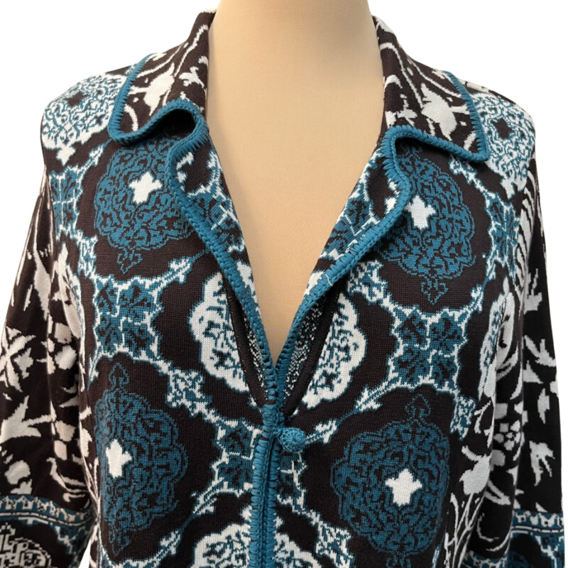 Chicos Floral Cardigan<br />
3/4 Sleeve<br />
55% Silk  45% Cotton<br />
Brown, Teal, and White<br />
Size: Medium