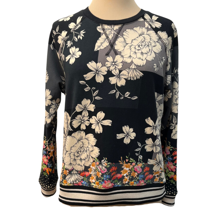 Johnny Was Redland Raglan Crew Sweatshirt<br />
Color: Black with Cream Flowers and Colorful Flowers on the Bottom and Sleeves<br />
96% Cotton 4% Lycra<br />
Size: XSmall<br />
<br />
It is still on the website for $168