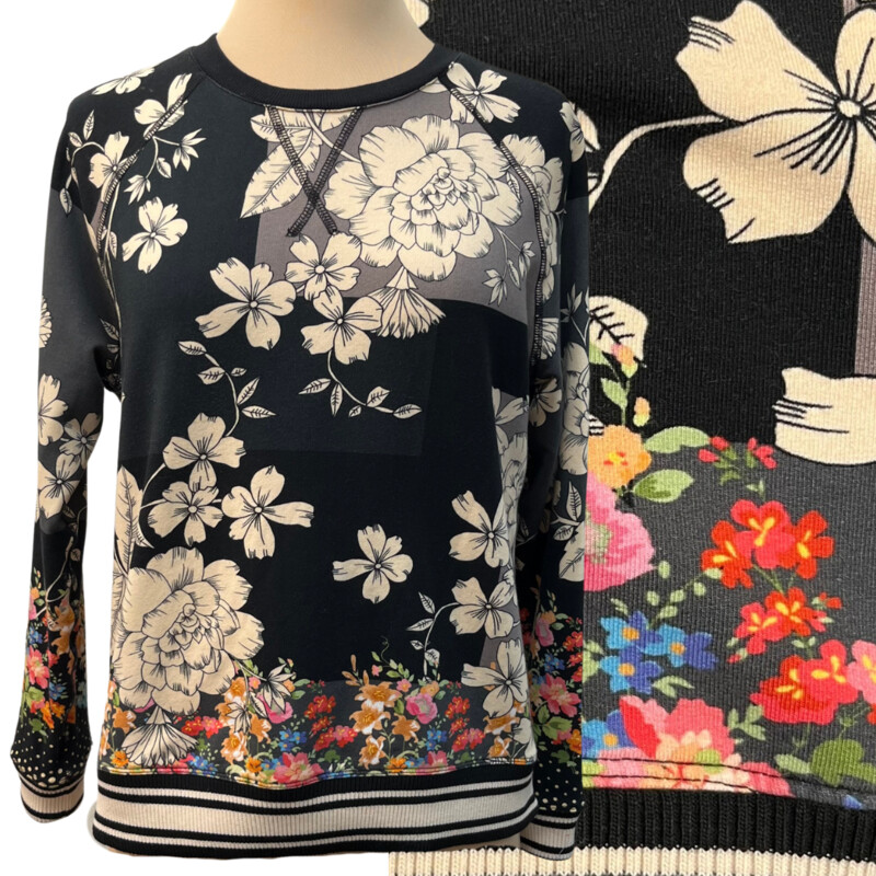 Johnny Was Redland Raglan Crew Sweatshirt
Color: Black with Cream Flowers and Colorful Flowers on the Bottom and Sleeves
96% Cotton 4% Lycra
Size: XSmall

It is still on the website for $168