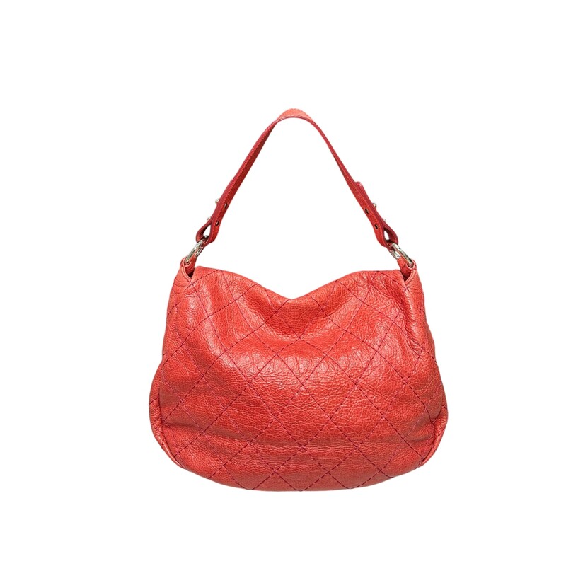 Chanel On The Road Red Hobo<br />
From the Spring/Summer 2010 Collection by Karl Lagerfeld<br />
Red Leather<br />
Interlocking CC Logo & Quilted Pattern<br />
Silver-Tone Hardware<br />
Flat Handle & Single Shoulder Strap<br />
Satin Lining & Dual Interior Pockets<br />
Snap Closure at Front<br />
<br />
*Some minor fading<br />
<br />
Code: 13347844<br />
Dimensions: Shoulder Strap Drop: 11.75<br />
Height: 10.75<br />
Width: 15.25<br />
Depth: 5.25