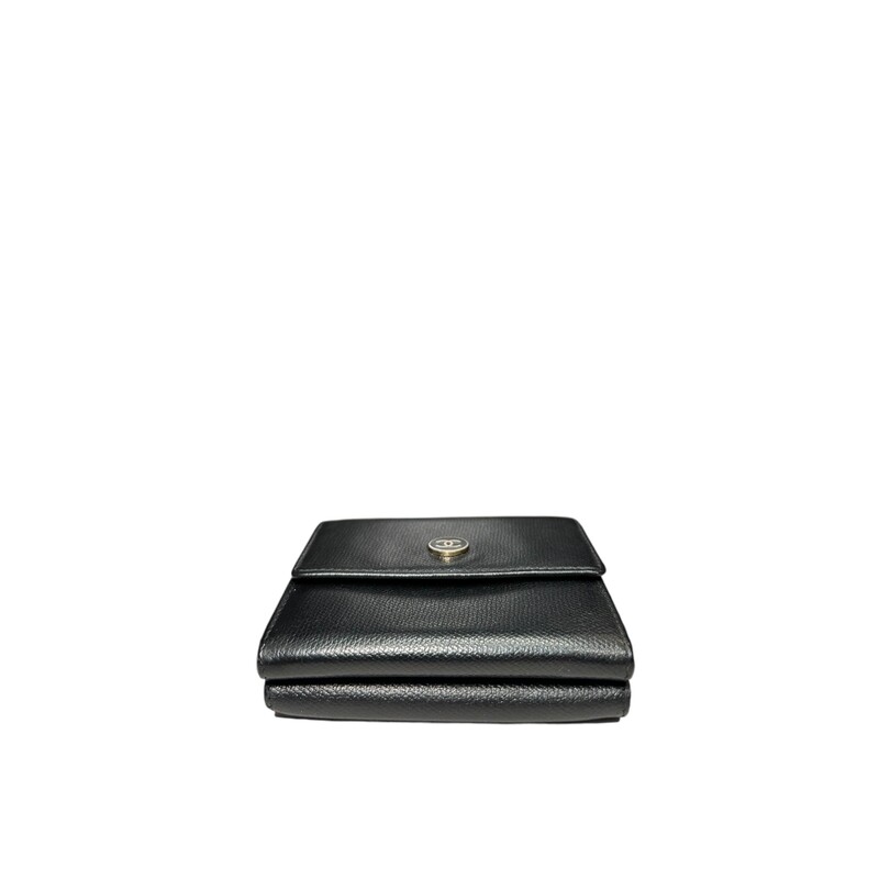 Chanel Trifold Compact, Black Compact<br />
Calfskin Leather<br />
Button snap closure<br />
Dimensions: 4x4