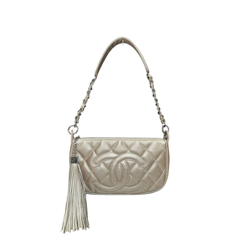 Chanel Shoulder Bag<br />
From the 2004-2005 Collection by Karl Lagerfeld<br />
Interlocking CC Logo, Quilted Pattern & Chain-Link Accent<br />
Silver-Tone Hardware<br />
Chain-Link Shoulder Strap<br />
Tassel & Chain-Link Accents<br />
Single Exterior Pocket<br />
Logo Jacquard Lining & Single Interior Pocket<br />
Zip Closure at Top<br />
<br />
Date Code:9662046<br />
<br />
Dimensions:<br />
Base length: 10.75 in<br />
Height: 7 in<br />
Width: 3.5 in<br />
Drop: 11.5 in