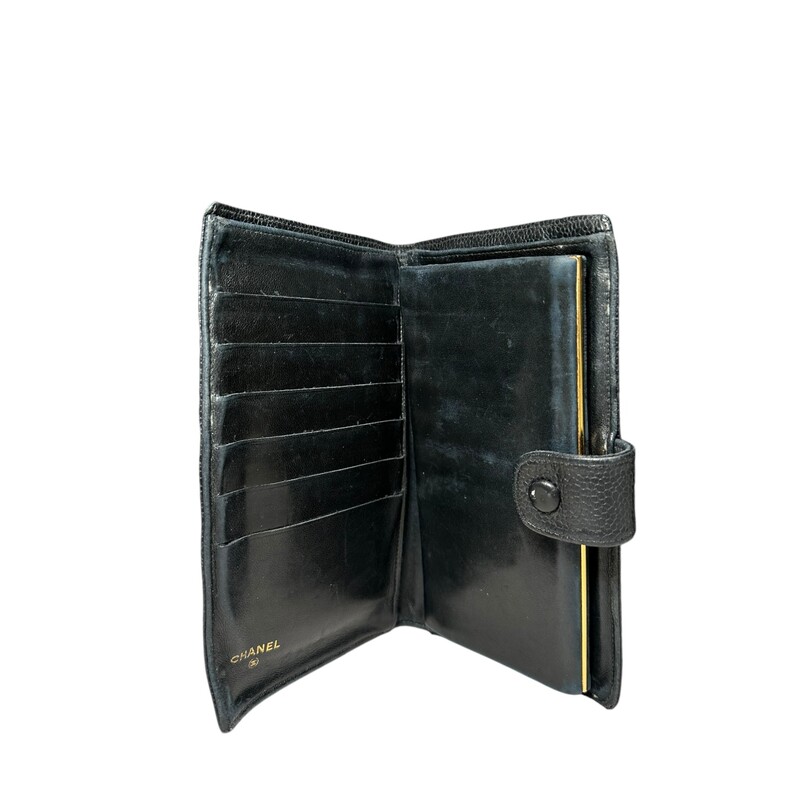 Vintage Chanel Caviar Black Long wallet<br />
Interior: 6 credit card pockets with 1 flat open pockets behind, 1 coin purse with 1 flat opened pocket behind, and 1 wide bill slot.<br />
Soe wear  and curling of coners<br />
Code: 4462581<br />
Circa 1996-1997