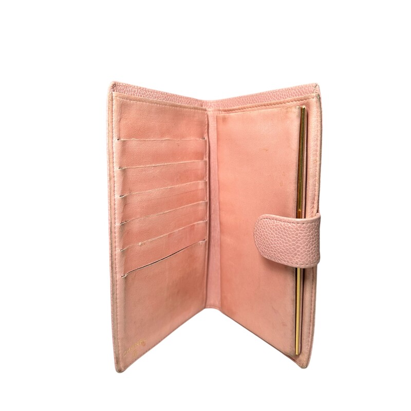 Vintage Chanel Caviar Pink Long wallet<br />
Interior: 6 credit card pockets with 1 flat open pockets behind, 1 coin purse with 1 flat opened pocket behind, and 1 wide bill slot.<br />
Some discolration and water marks inside the interior wallet