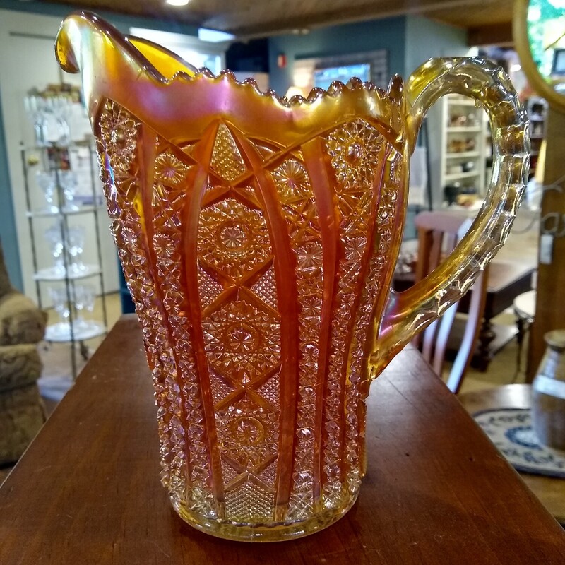 Vtg Marigold Carnival Glass Pitcher

Vintage Imperial marigold color carnival glass pitcher in excellent condition.  No chips or cracks!

Size: 8 In tall