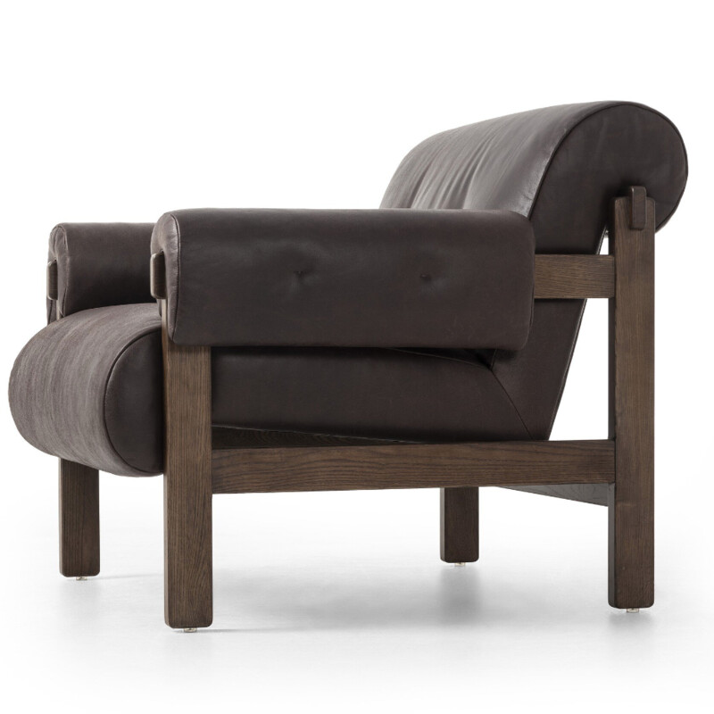 Four Hands Cora Chair in Conroe Cigar Leather<br />
<br />
<br />
Size: 34.5Wx35.5x30.5T<br />
<br />
This found fireside chair is the embodiment of comfort with its S-spring seating construction, plush seat and back, and feather fiber-filled arm cushions. Blind tufts on the arms and back lend a subtle detail that elevates the overall style.