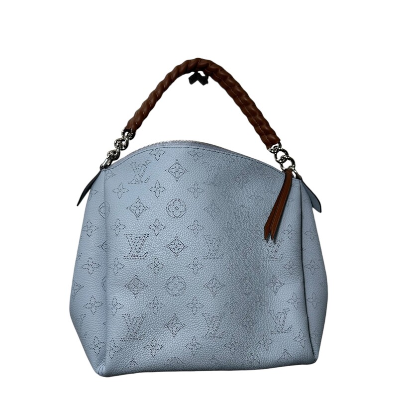 LOUIS VUITTON Mahina Babylone Chain BB in Bleu Horizon and Pumpkin. This tote is crafted of perforated Louis Vuitton monogram on light blue leather. This bag features silver hardware, a removable brown leather crossbody strap, and a leather-wrapped silver chain shoulder strap. The top zipper opens to an interior of dark orange suede with zipper and patch pockets.

Date Code:AH0149

Base length: 9.50 in
Height: 9.50 in
Width: 5.00 in
Drop: 4.00 in
Drop: 18.25 in