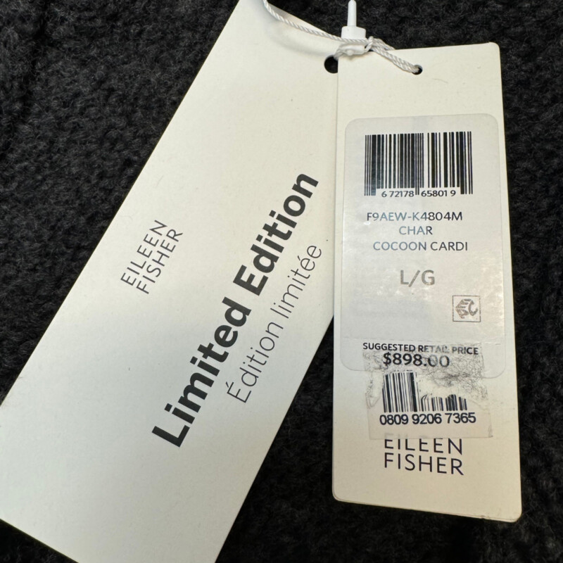 NEW Eileen Fisher Cocoon Cardigan<br />
Limited Edition<br />
60% Merino Wool 25% Cashmere 15% Silk<br />
Color: Dark Gray<br />
Size: Large<br />
Retails for $898