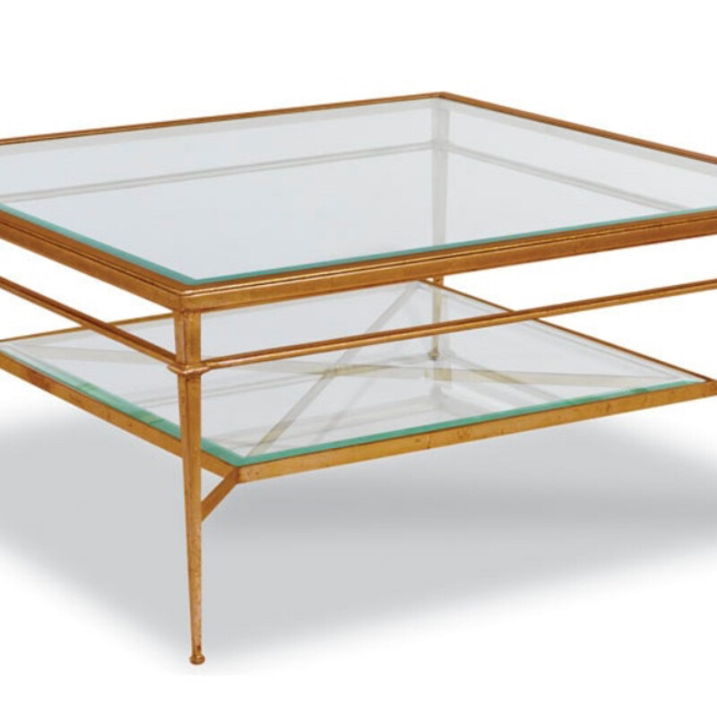 Woodbridge Furniture Madeline Cocktail Table
Gold Clear Size: 42 x 42 x 19H
Retails: $2500+

A lovely table inspired by 19th Century French originals with a rectangular 1/2 beveled glass top. The glass is fitted inside a top frame that is elevated by gracefully tapering posts, joined by shaped stretchers.

Materials: Forged steel with beveled glass top