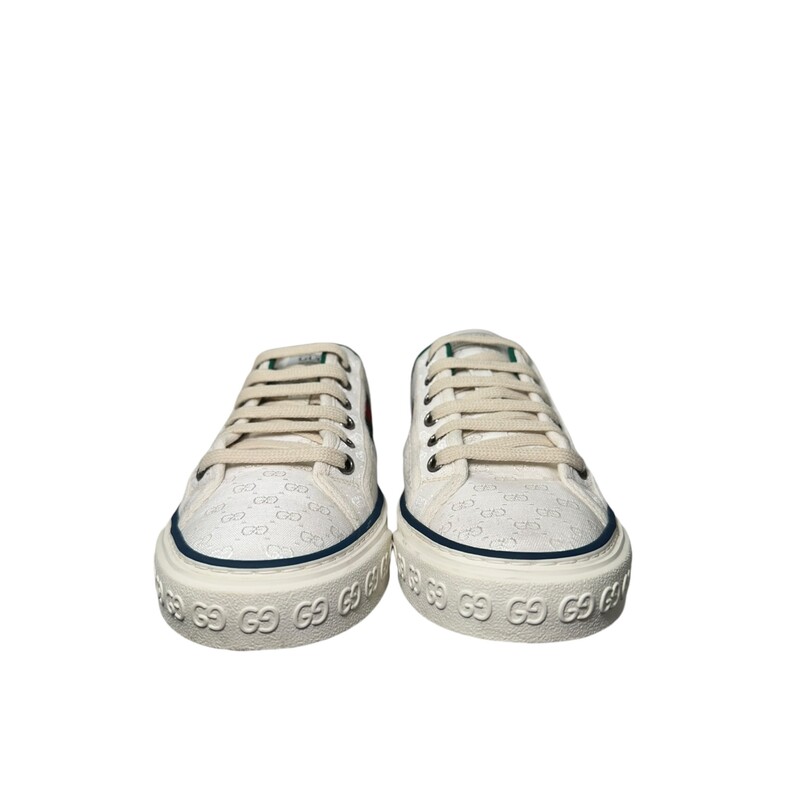 Gucci Tennis 1977 label
This pair of Gucci Tennis 1977 is defined by the iconic green and red Web.
White Canvas
GG motif at the sole
Rubber sole
Lace-up closure
Made in Italy

Comes with dust bags and box