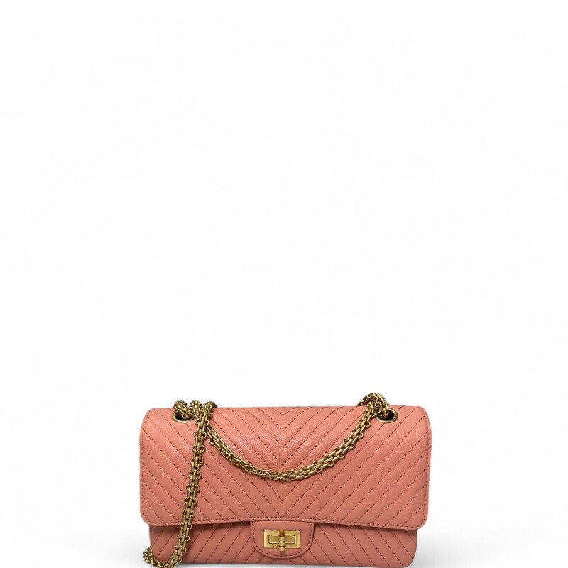 Chanel Reissue Double Flap Bag Chanel 2.55 Coral/Pink  chevron-quilted aged calfskin  with gold-tone hardware, convertible chain-link shoulder strap, single exterior patch pocket at back, single zip pocket at flap underside, midnight leather interior lining, dual interior slip pockets at interior wall and mademoiselle turn-lock closure at front flap. Includes authenticity card and dust bag.
Shoulder Strap Drop: 19.5
Height: 4.75
Width: 9.5
Depth: 2.75
Comes With Box and dust bag
Code : 23372141