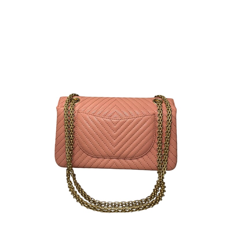 Chanel Reissue Double Flap Bag Chanel 2.55 Coral/Pink  chevron-quilted aged calfskin  with gold-tone hardware, convertible chain-link shoulder strap, single exterior patch pocket at back, single zip pocket at flap underside, midnight leather interior lining, dual interior slip pockets at interior wall and mademoiselle turn-lock closure at front flap. Includes authenticity card and dust bag.<br />
Shoulder Strap Drop: 19.5<br />
Height: 4.75<br />
Width: 9.5<br />
Depth: 2.75<br />
Comes With Box and dust bag<br />
Code : 23372141