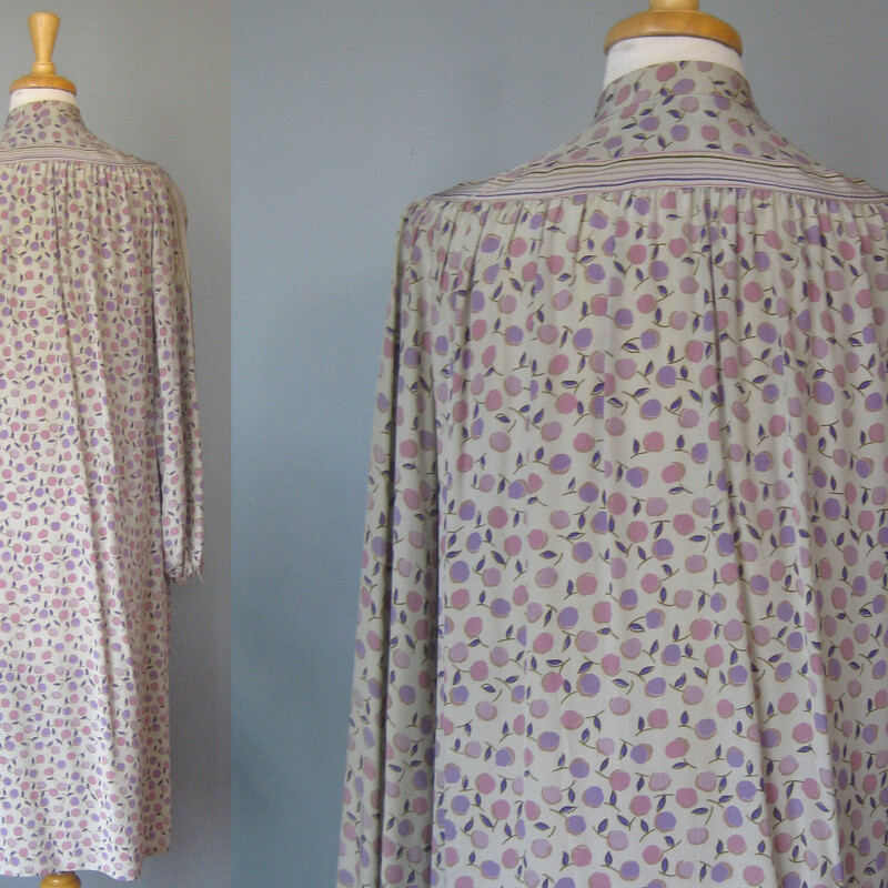 Francesca Damon Silk, Gray, Size: 10<br />
Here is a pretty silk dress is soft grays and lavender with a subtle floral print.<br />
It's from the 1980s.<br />
by Francesca Damon for Starington and it was purchased at Neiman Marcus.<br />
Made in Hong Kong<br />
The dress has hidden buttons all the way down the front.<br />
It has a high collar with attached sash ties.<br />
It comes with a matching sash, wider than the neck ties but not long enough to serve as a belt.<br />
Unlined<br />
Pockets<br />
Long sleeves with button cuffs<br />
small shoulder pads.<br />
it's marked size 10 but use these measurements to be sure it will fit. It seems like it will fit larger than a modern size 10.<br />
Flat measurements:<br />
Shoulder to shoulder: 14.5<br />
armpit to armpit: 23.5<br />
Waist: 24<br />
Hip: up to 25<br />
Length: 44<br />
Underarm sleeve seam: 19 (sleeve buttons at the end)<br />
<br />
perfect condition!<br />
<br />
Thanks for looking!<br />
#72244