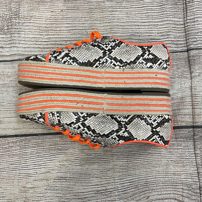 Snake skin print with neon orange trim platform bottoms size 9.