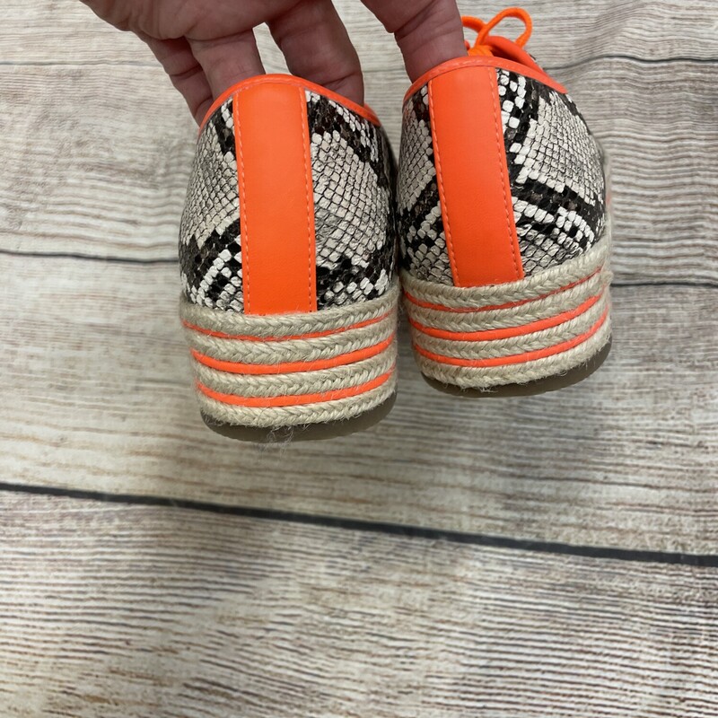 Snake skin print with neon orange trim platform bottoms size 9.