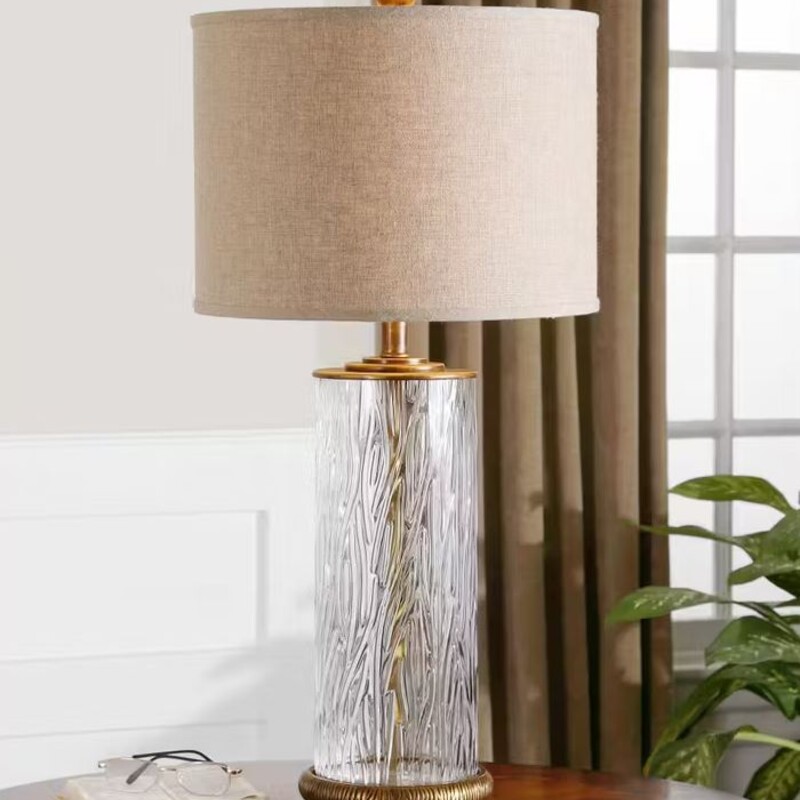 Uttermost Tomi Table Lamp
Clear Cream Gold Size: 15 x 31H
Matching lamp sold separately
Retails: $269+