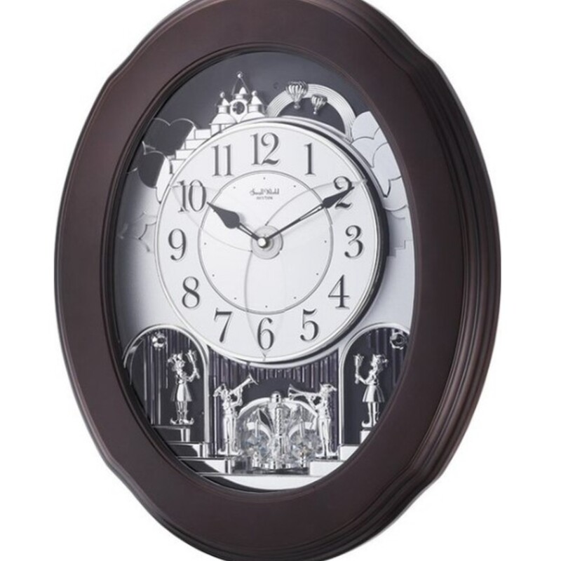 Small Rhythm 30 Melody Wall Clock
Dark Brown Silver  and Swavorski Crystals
Size: 15x20H
Allow us to enchant you with the new Joyful Blessing Clock in Espresso. On the hour, the dial splits to reveal colorful bells and musical notes that rotate. The dial rejoins at the bottom then closes back up all while one of 30 melodies play. This piece features a rotating pendulum set with crystals. We are blessed to be able to introduce this new addition to our collection of elegant timepieces. Clock is battery quartz operated. Plays one of 30 melodies every hour on the hour from 3 different melody selections (Christian, Christmas and Classics)
Retail $520