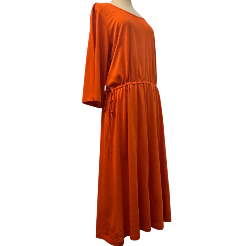 Gudrun Sjödén Dress<br />
Organic Cotton and Modal<br />
Drawstring Waist with Pockets<br />
3/4 Sleeves<br />
Color:  Orange<br />
Size: Large