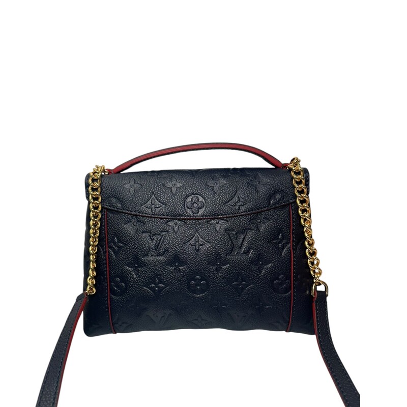 Louis Vuitton Shoulder Bag<br />
By Nicolas Ghesquière<br />
Rouge Empreinte Leather<br />
LV Monogram<br />
Brass Hardware<br />
Single Adjustable Shoulder Strap<br />
Single Exterior Pocket<br />
Canvas Lining & Dual Interior Pockets<br />
Push-Lock Closure at Front<br />
<br />
Dimensions: Shoulder Strap Drop: 20.75<br />
Height: 6.25<br />
Width: 8.75<br />
Depth: 2.5<br />
<br />
Date Code : SD 2128<br />
<br />
Comes with dust bag.