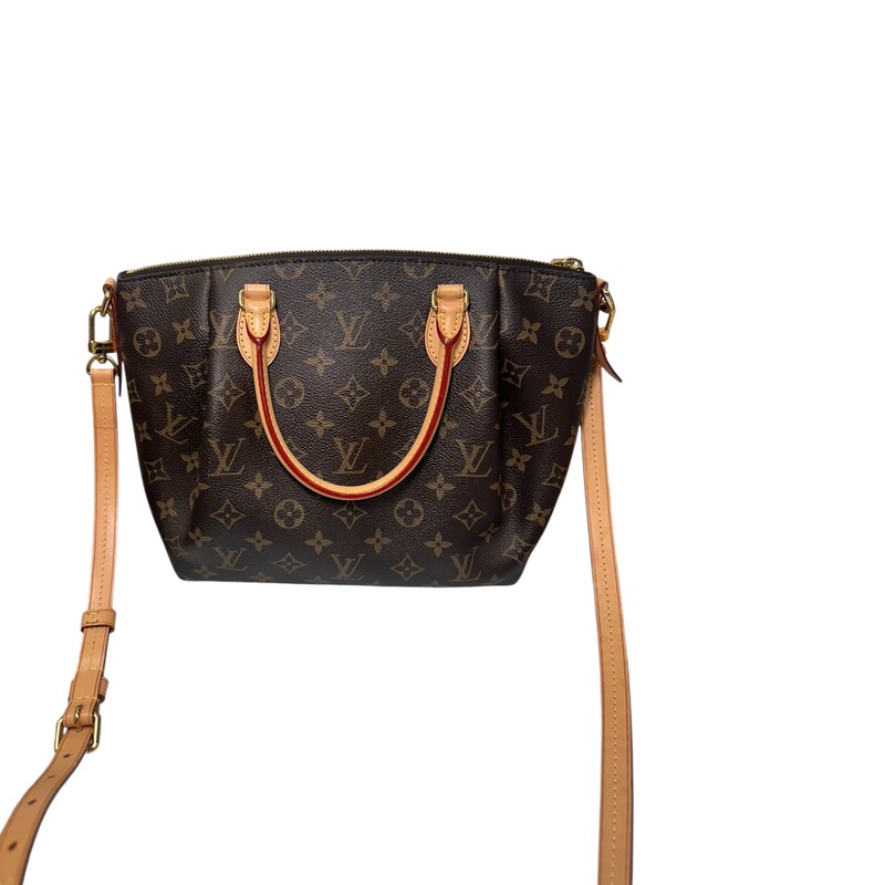 Louis Vuitton monogram on toile pleated canvas. The bag features vachetta cowhide rolled leather top handles with small brass links and a leather cross-body shoulder strap with brass clasps. The wrap-across top zipper opens to a plum fabric interior<br />
Dimensions: 9Hx 13 L<br />
Date Code: SD0137