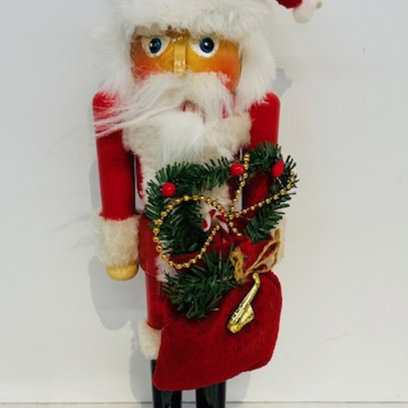 Kurt Adler Nutcracker
Xmas colors Size: 5 x 15H
Original box included