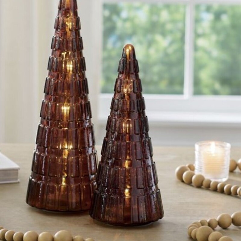 Grandin Road Lit GlassTree
Brown Glass
Size: 6x11.5H
Battery Included
Simple and sophisticated, our Pre-lit Amber Glass Trees are lit from within and feature a unique, textural finish that reflects the light in your space. They glow with all the warmth of the holiday.
Matching Smaller Tree Sold Separately
Retail $40