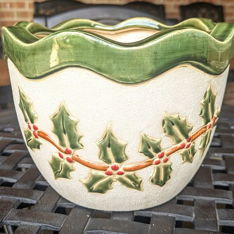 Holly Scalloped Flower Pot
 Xmas Colors
Size: 9x7H
Has Removable Drain Hole Plug
Smaller  Matching Pot Sold Separately