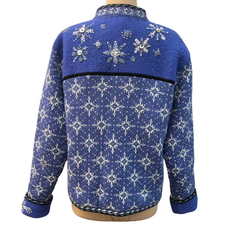 Icelandic Snowflake Zip Cardigan<br />
100% Wool<br />
Button Detail On Snowflakes<br />
Snowflakes on Sleeve Cuffs<br />
Blue and White<br />
Size: Large