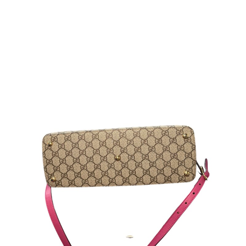 Gucci Supreme Red and Magenta<br />
 Detachable strap<br />
Top Zip closure<br />
Style Code:  409534 525040<br />
Minor peeling by the strap buckle