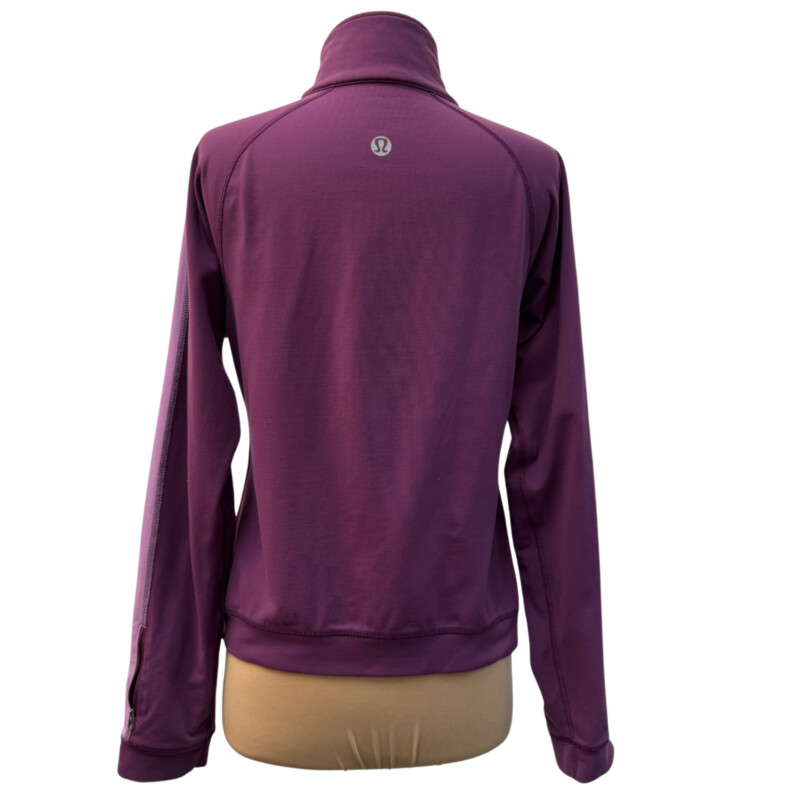 Lululemon Zip Jacket<br />
Colorblock Design<br />
Zipper Pocket on Sleeve<br />
Lavender and Lilac<br />
Size: Medium