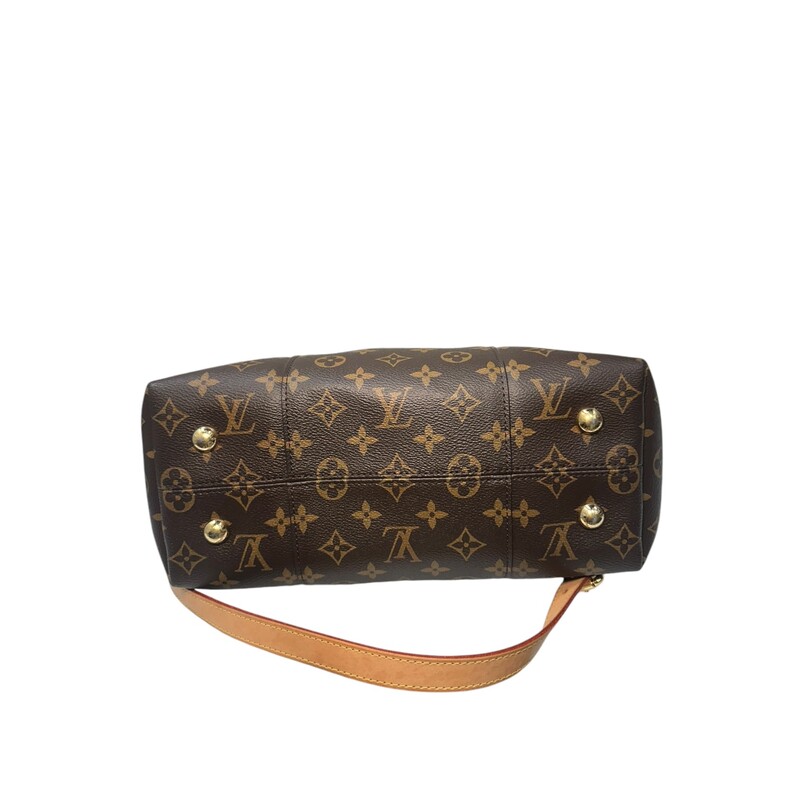 LOUIS VUITTON Monogram Melie. This chic hobo bag is finely crafted of classic Louis Vuitton monogram coated canvas in brown. The bag features zipper pockets on either side, a vachetta leather top handle, and a removable, adjustable vachetta leather shoulder strap with polished gold hardware. The top is open to a deep purple microfiber interior with patch pockets.<br />
Dimensions:<br />
Base length: 12 in<br />
Height: 13.75 in<br />
Width: 4.5 in<br />
Drop: 3.5 in<br />
Drop: 14 in<br />
Date Code: SA0188<br />
<br />
Some water marks on tag shown in photo.